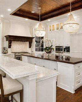 An elegant kitchen with dark wood accents