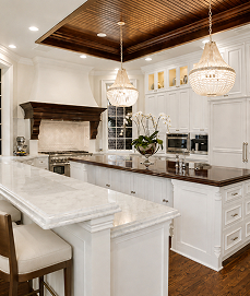 An elegant kitchen with dark wood accents